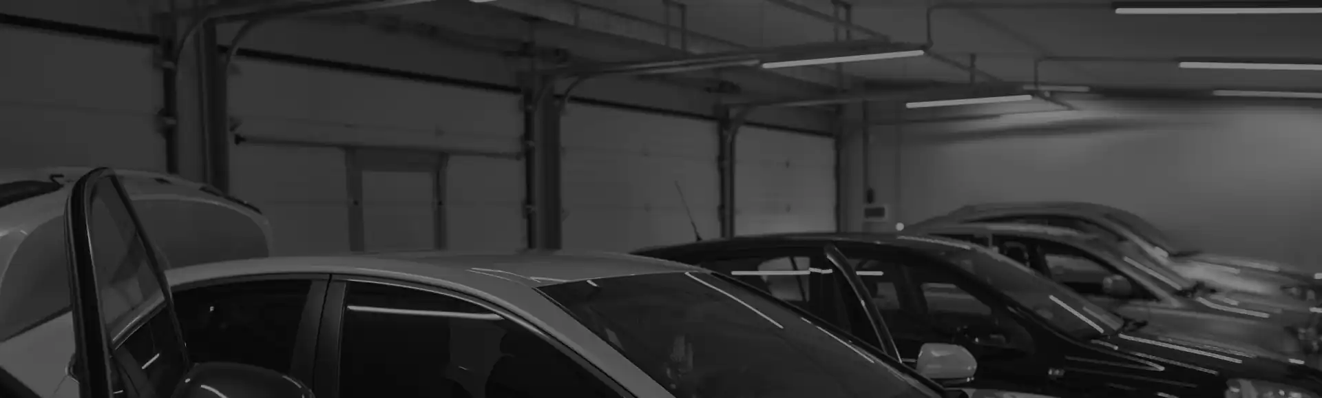 Car garage interior with parked cars